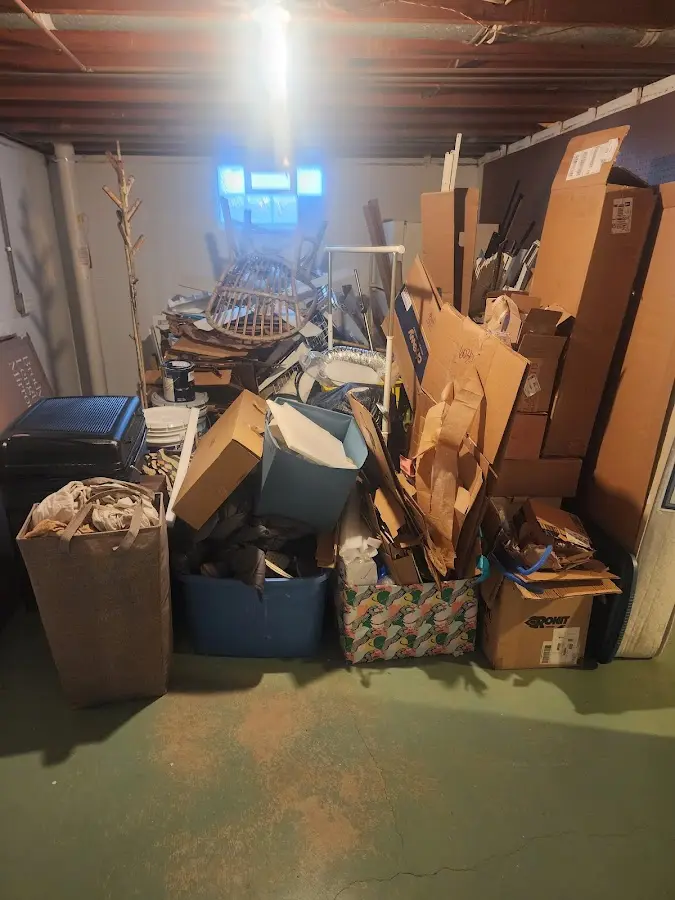 Roll-off dumpster container at job site for Yard Waste Dumpster Rental in Rainbow City